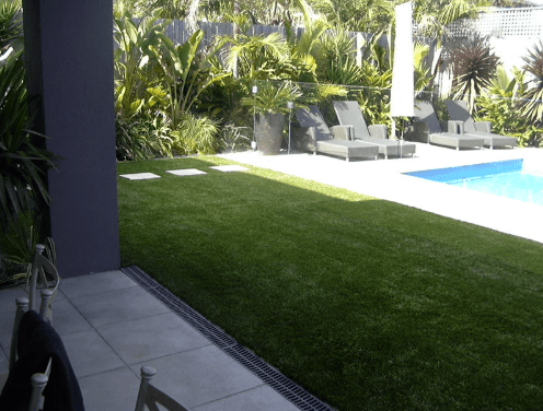 SYNLawn surrounding a pool
